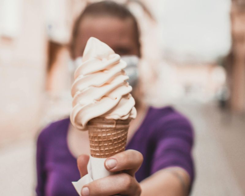 A vanilla soft-serve ice cream cone. Temporary concept photography.