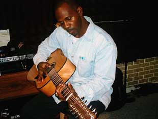 Raphael Ashanti with guitar