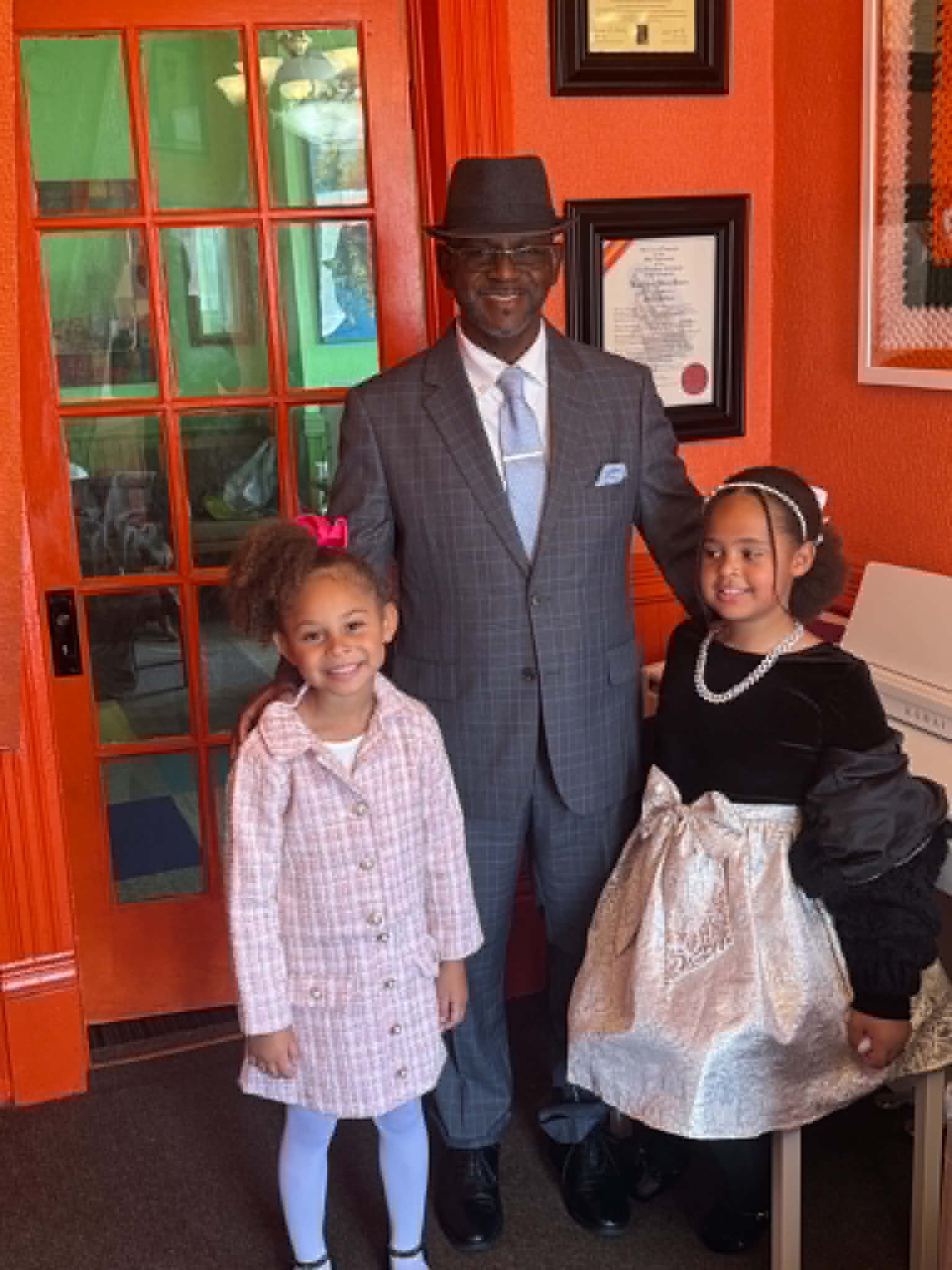 Raphael Ashanti with his granddaughters
